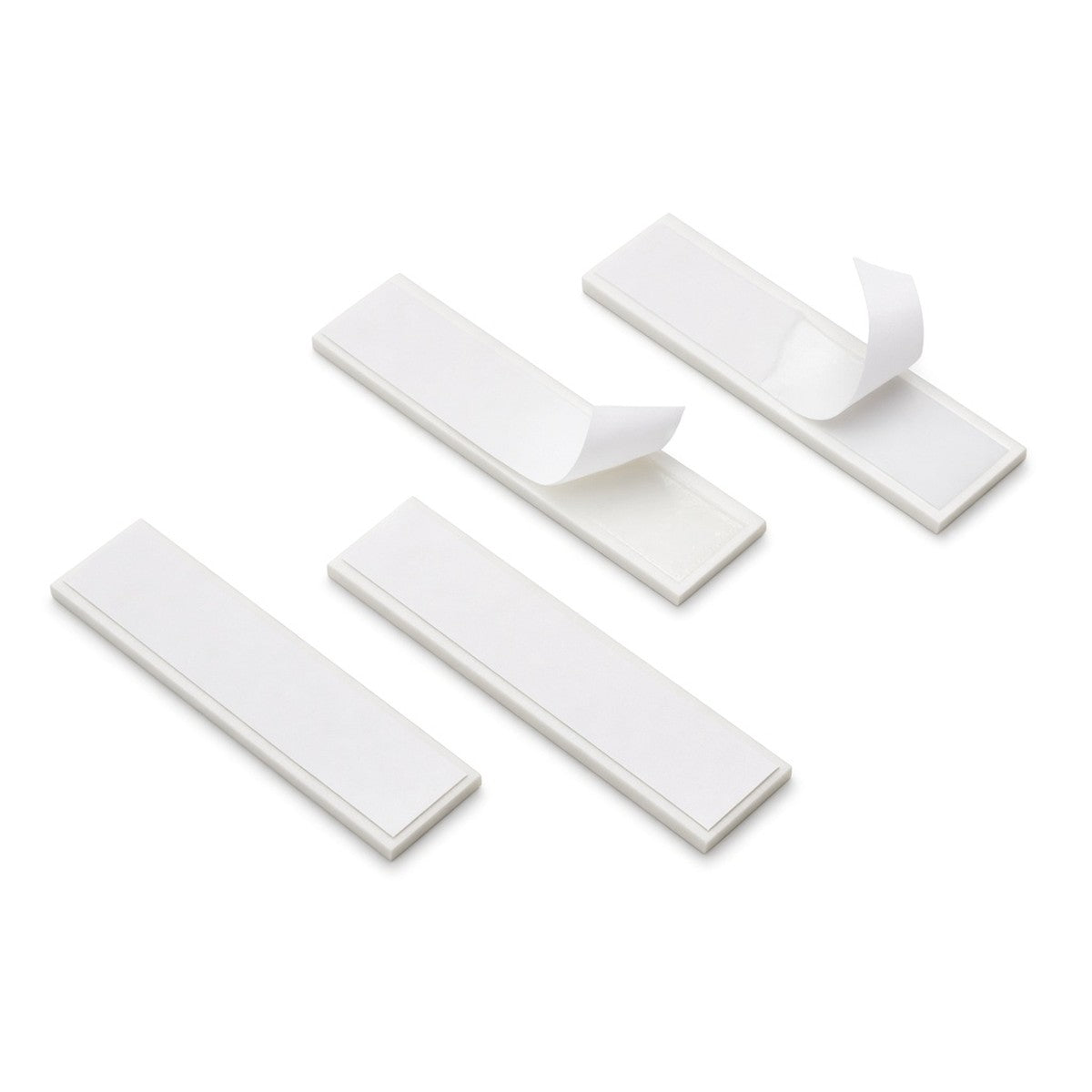 White rectangular double-sided adhesive strips with peel-off liners for fitting number plates